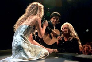 FILE PHOTO - Jeanne Moreau (R), President of the Jury at the 48th Cannes Film Festival, sings with Vanessa Paradis as part of the opening evening program of the festival in Cannes, France, May 17, 1995. Actress Jeanne Moreau has died, aged 89, in Paris, France, July 31, 2017. Picture taken May 17, 1995. REUTERS/Stringer/File Photo